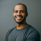 Portrait of a businessman on gray background